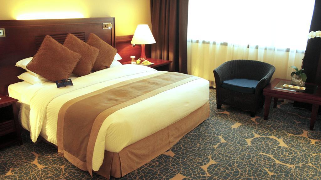 Radisson Blu Resort, Sharjah Exterior foto A room at the hotel
